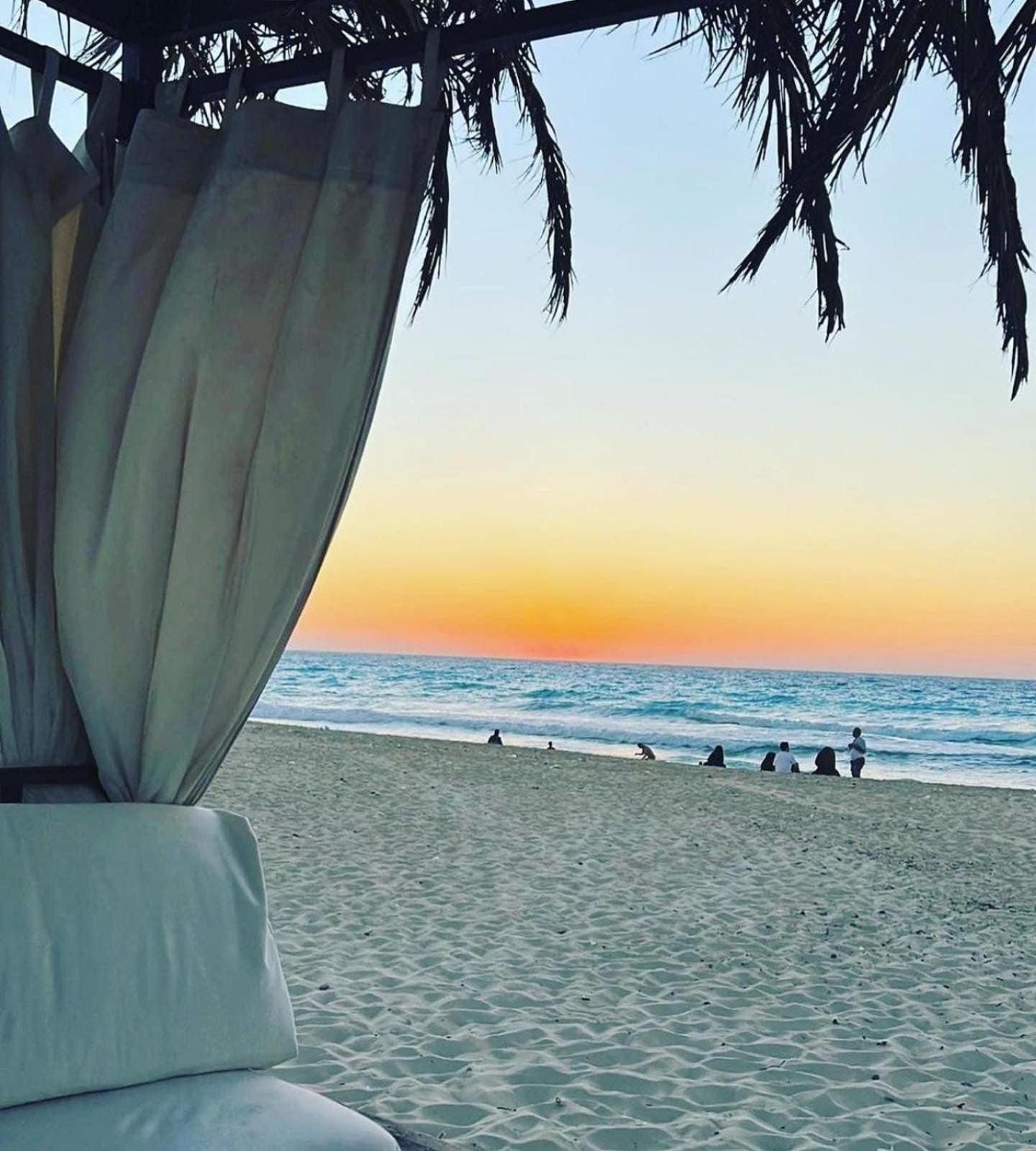 Borg El Arab Beach Resort Екстериор снимка Sunset at the beach