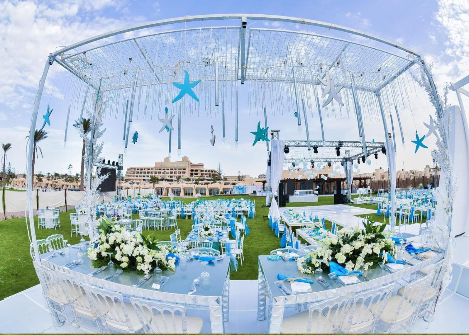 Borg El Arab Beach Resort Екстериор снимка The lawn at the Jumeirah Beach Hotel