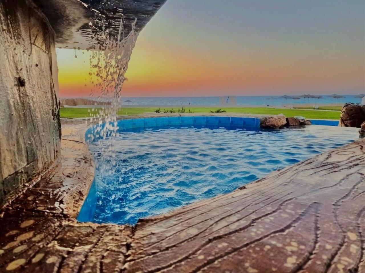 Borg El Arab Beach Resort Екстериор снимка Sunset at the beach